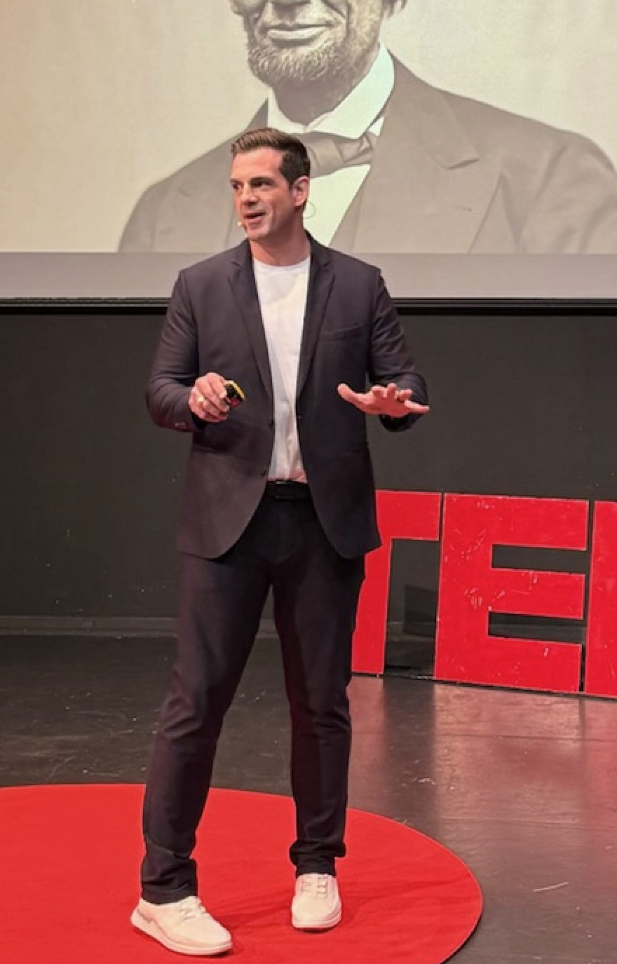 Chris Valletta on the TEDx stage